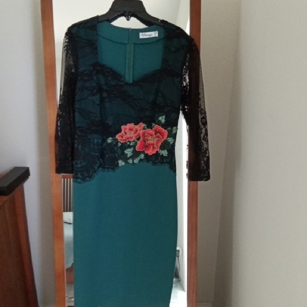 Elegant Teal Dress with Black Lace Sleeves and Floral Accents